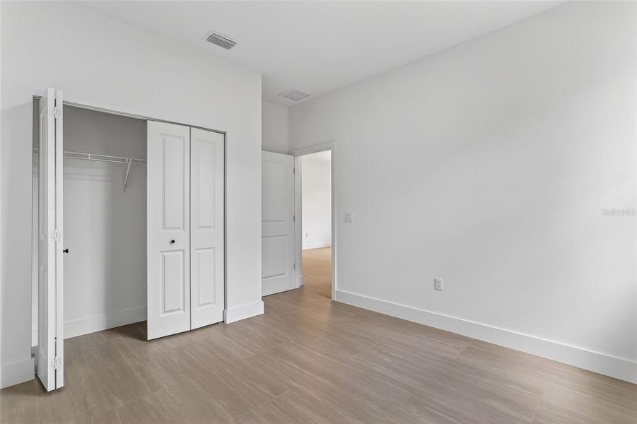 Spacious, unfurnished interior of a new home in , Port Charlotte (Image 36).