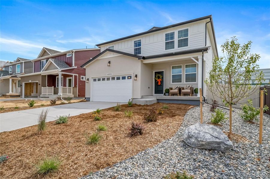 Front exterior of a new home in , Aurora, CO, highlighting curb appeal (Image 2). Front exterior of a new home in , Aurora, CO, highlighting curb appeal (Image 2).