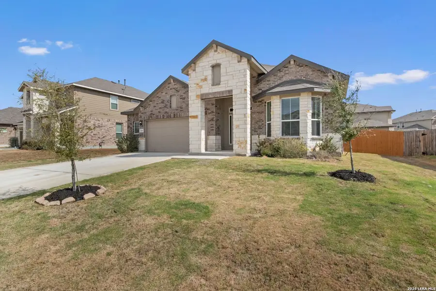 Front exterior of a new home in Steele Creek, Cibolo, TX, highlighting curb appeal (Image 13).