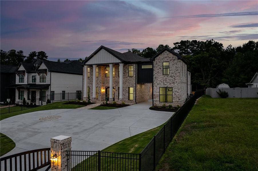 Front exterior of a new home in , Buford, GA, highlighting curb appeal (Image 1). Front exterior of a new home in , Buford, GA, highlighting curb appeal (Image 1).