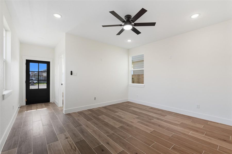 The inviting entryway welcomes you with a bold black front door and abundant natural light, setting the tone for the home. The inviting entryway welcomes you with a bold black front door and abundant natural light, setting the tone for the home.