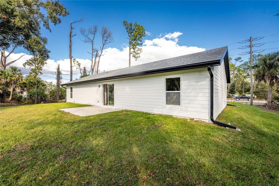 Exterior details and patio area of a home in , North Port (Image 24).