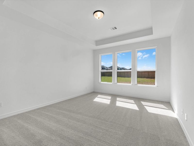 Primary bedroom. Sample product photo. Actual exterior and interior selections may vary by homesite. Photo may be virtually staged.