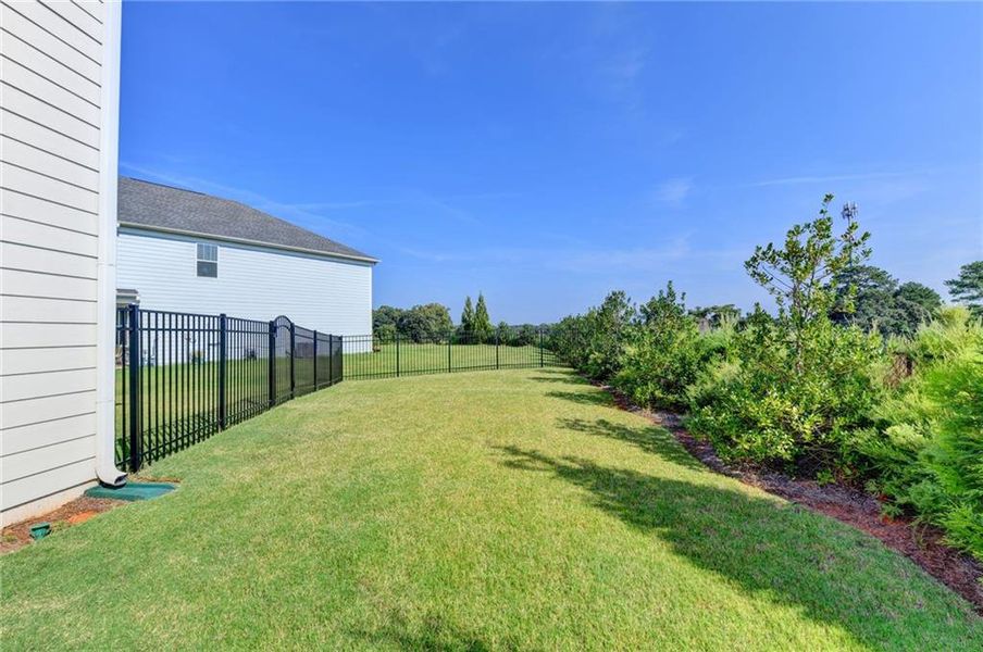 Exterior details and patio area of a home in Sweetbay Farm, Lawrenceville (Image 24).