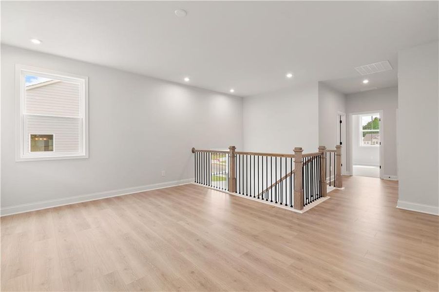 Spacious, unfurnished interior of a new home in The Paddocks at Doc Hughes, Buford (Image 27).