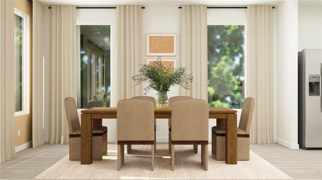 Dining space with hardwood / wood-style flooring