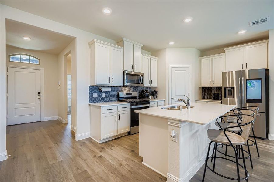 Furnished interior view inside a new home in , Little Elm (Image 28).