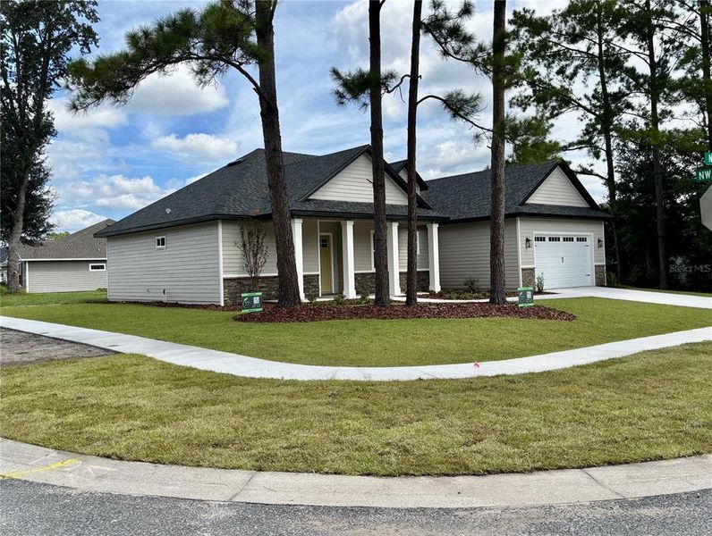 Front exterior of a new home in , High Springs, FL, highlighting curb appeal (Image 13).