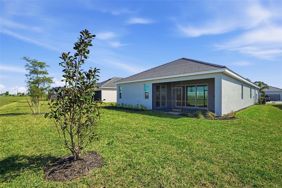 Exterior details and patio area of a home in Wellen Park Golf & Country Club, Venice (Image 3).