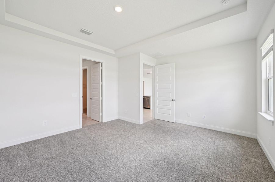 Spacious, unfurnished interior of a new home in Hampton Park - Signature Series, Vero Beach (Image 25). Spacious, unfurnished interior of a new home in Hampton Park - Signature Series, Vero Beach (Image 25).