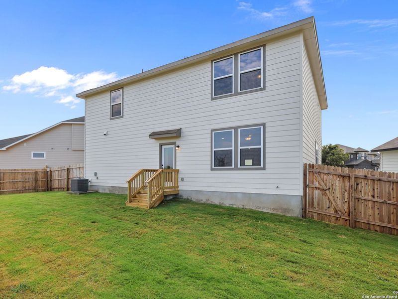 Exterior details and patio area of a home in Royal Crest, San Antonio (Image 3).