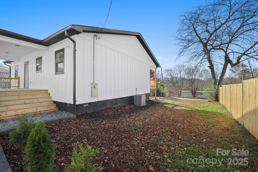 Exterior details and patio area of a home in , Bryson City (Image 34).