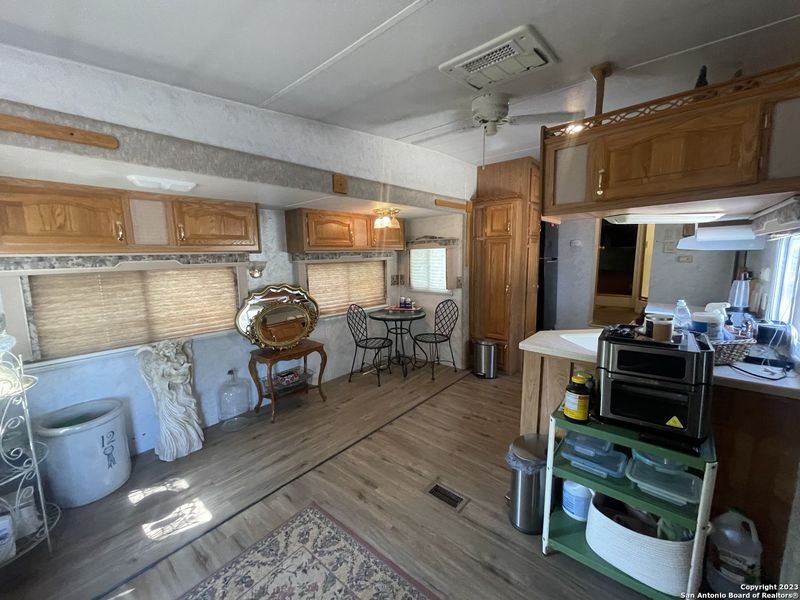 Furnished interior view inside a new home in , Bandera (Image 54).