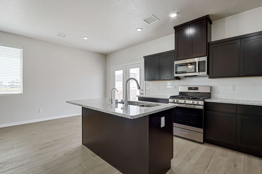 Representative furnished interior of a home built from the Desert Willow by View Homes in Paseos Del Este, Horizon City (Image 17). Representative furnished interior of a home built from the Desert Willow by View Homes in Paseos Del Este, Horizon City (Image 17).