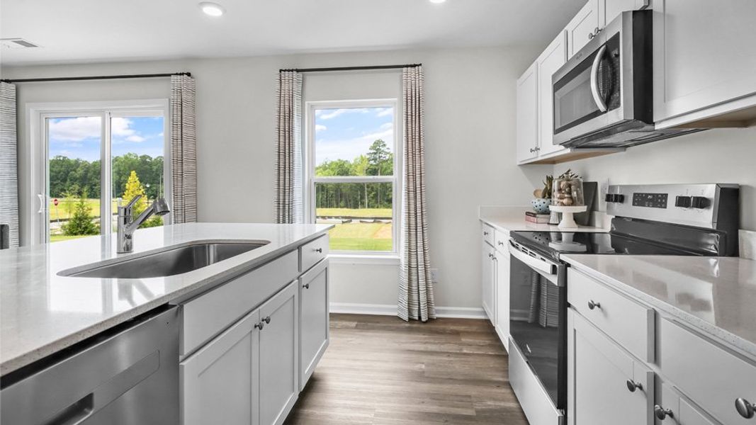 Representative furnished interior of a home built from the BELHAVEN by D.R. Horton in Lawson Glen, Clayton (Image 14).