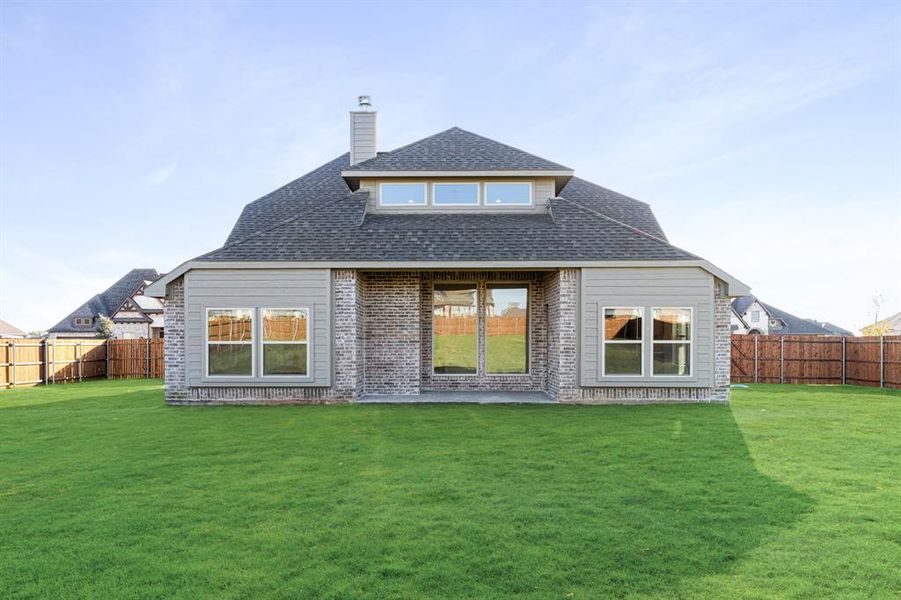 Exterior details and patio area of a home in Coyote Crossing, Godley (Image 4).