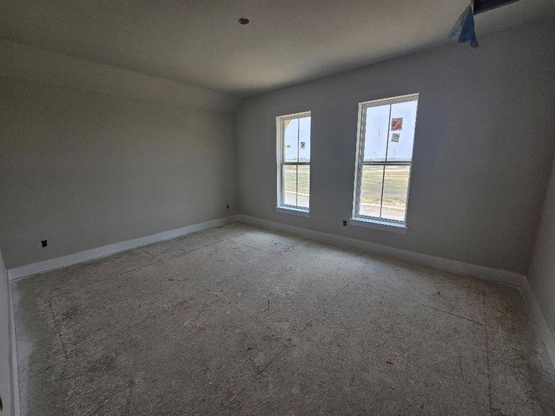 Empty room featuring baseboards Empty room featuring baseboards