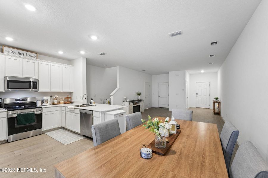Furnished interior view inside a new home in Longbay Townhomes, Middleburg (Image 13).