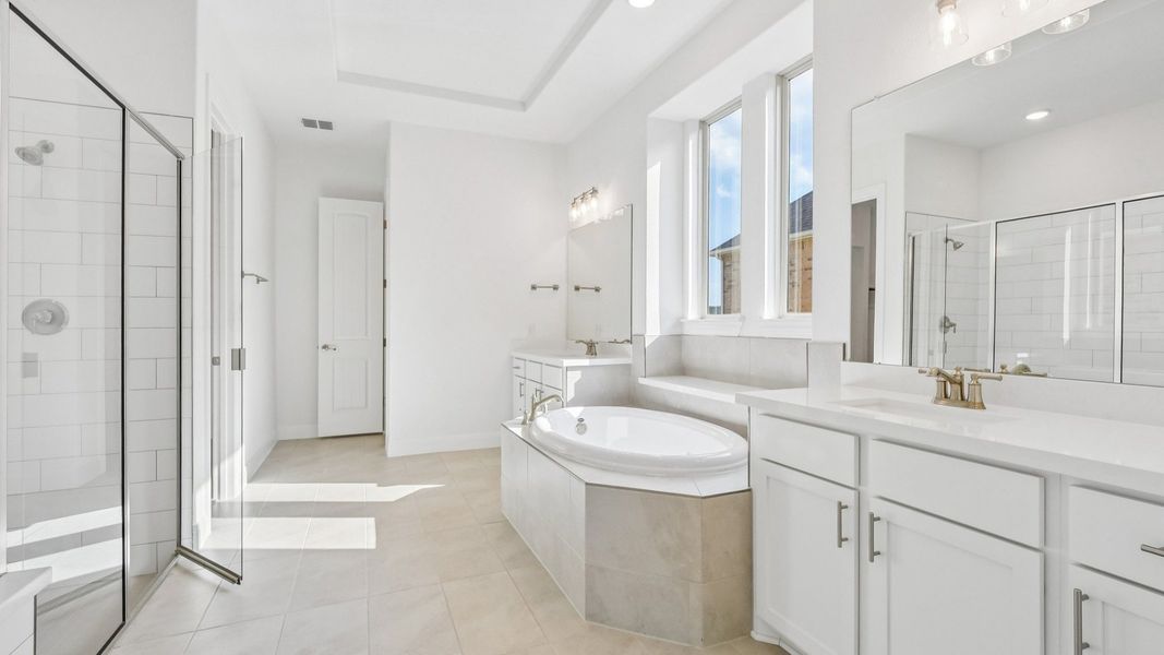 An interior shot of the Primary Bathroom in the Brown floorplan at Retreat at San Gabriel - Representative Image An interior shot of the Primary Bathroom in the Brown floorplan at Retreat at San Gabriel - Representative Image