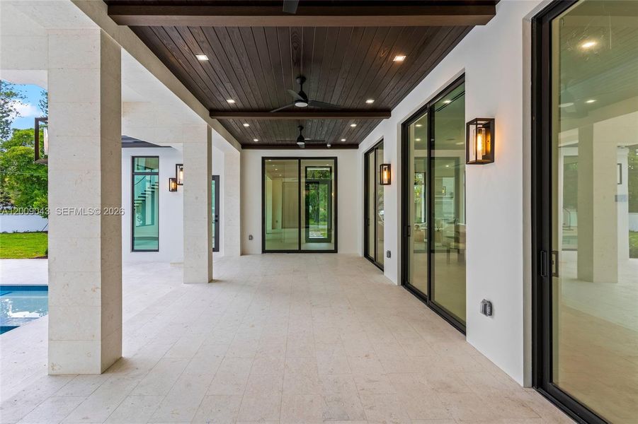 Exterior details and patio area of a home in , Coral Gables (Image 22).