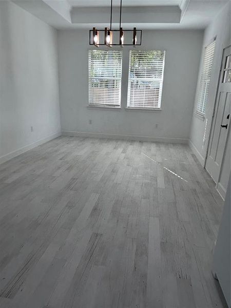 Formal Dining area with enough natural light to enhance your family's most important dinner gatherings