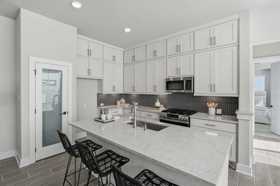 Furnished interior view inside a new home in Prominence – Now Selling, San Antonio (Image 9).