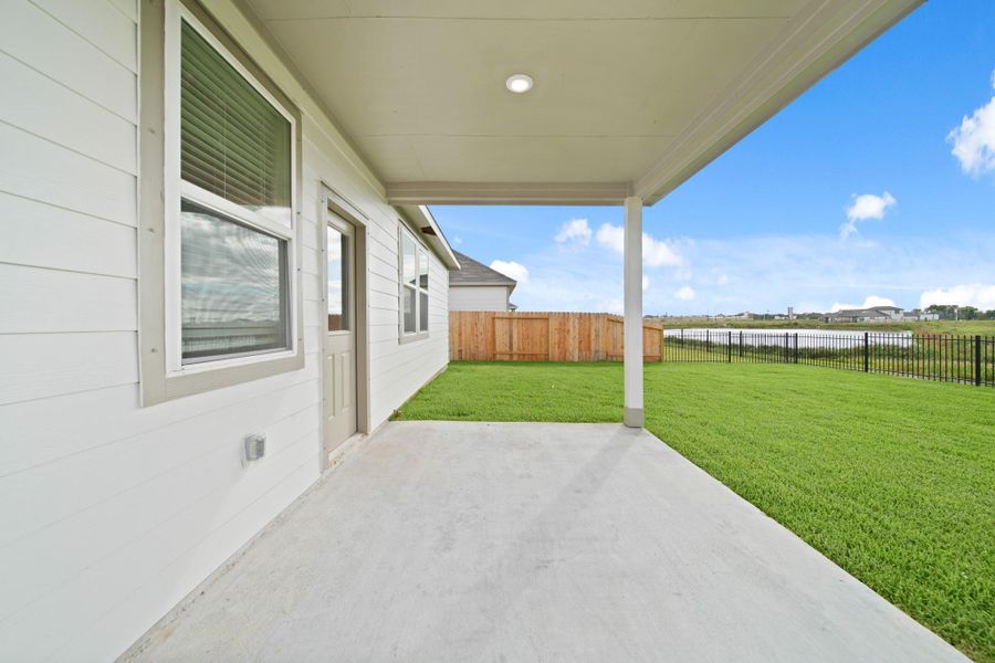 Exterior details and patio area of a home in Russell Ranch, Bay City (Image 16).