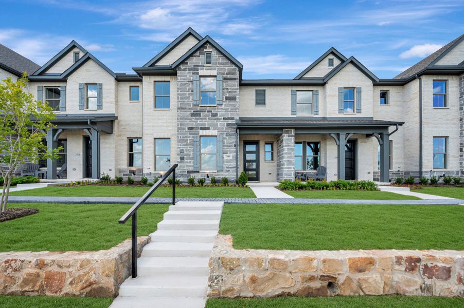 Front exterior of a new home in Ridgeline Towns, McKinney, TX, highlighting curb appeal (Image 1). Front exterior of a new home in Ridgeline Towns, McKinney, TX, highlighting curb appeal (Image 1).