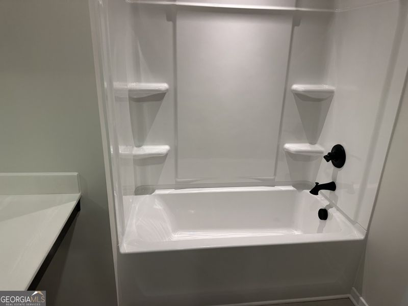 Furnished interior view inside a new home in Millstone at Mundy Mill, Gainesville (Image 27).