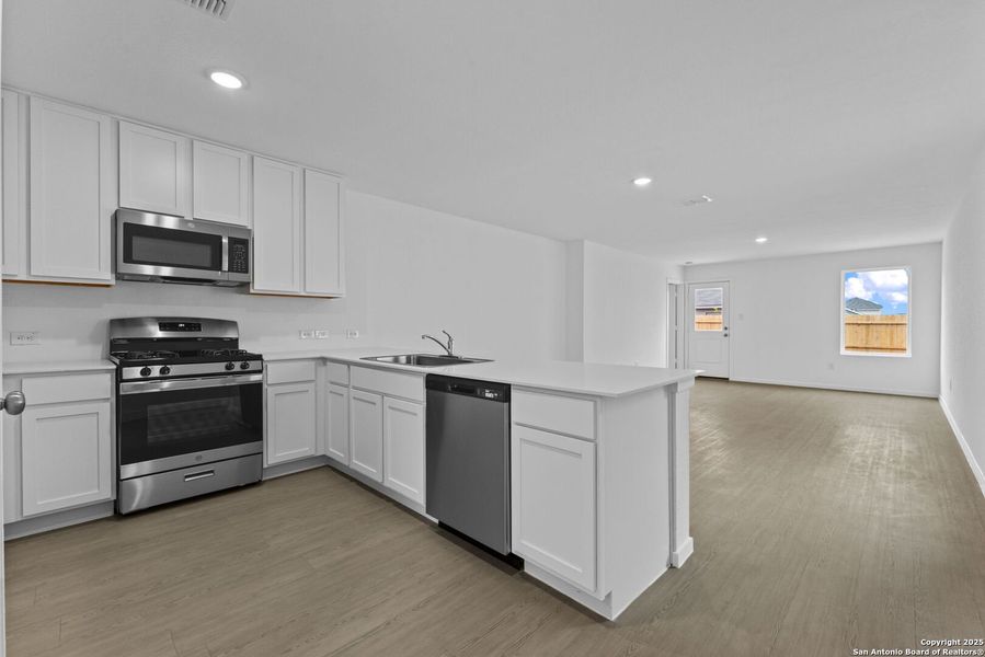 Furnished interior view inside a new home in Torian Village: Belmar Collection, San Antonio (Image 7).