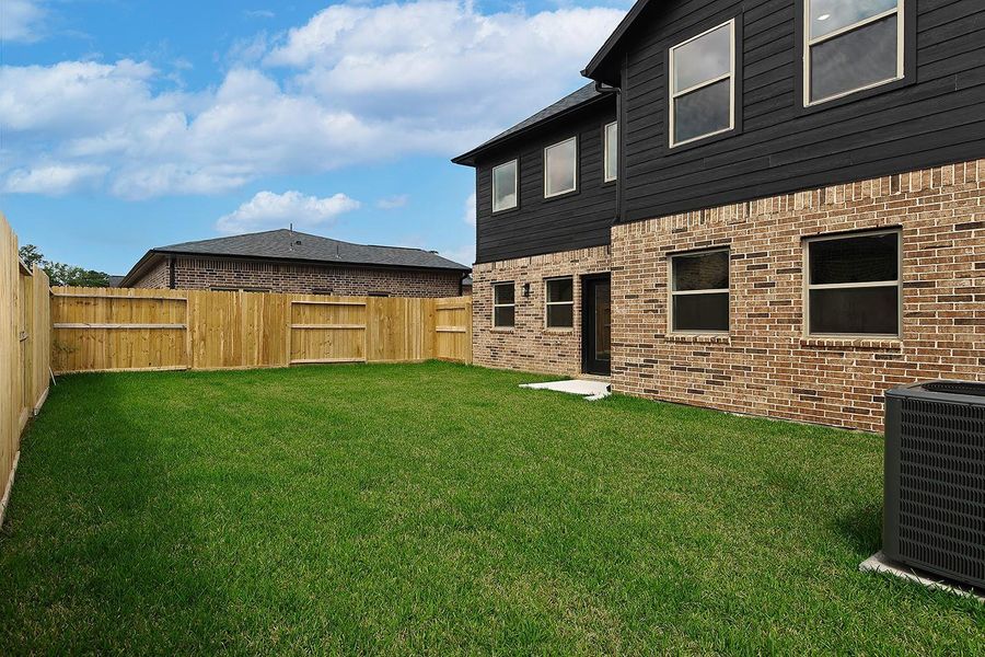 Exterior details and patio area of a home in , Spring (Image 15).