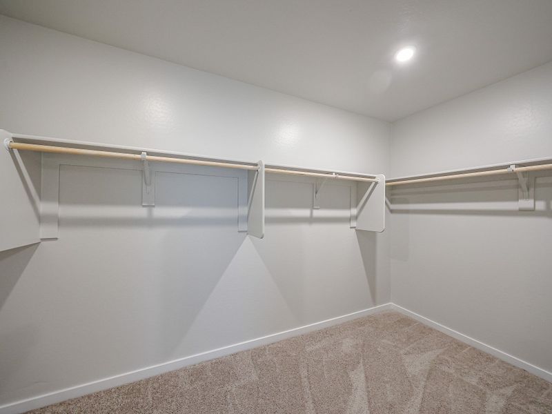 A white bathtub in a room. A white bathtub in a room.