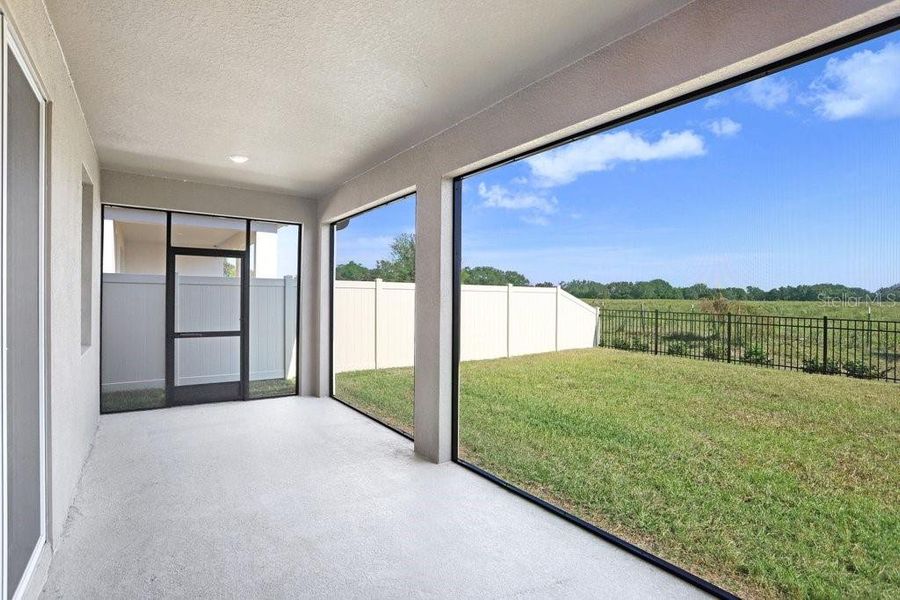 Exterior details and patio area of a home in Westgate at Avalon Park, Wesley Chapel (Image 4).