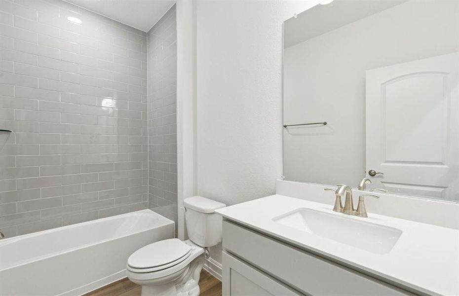 Elegant secondary bath with contemporary design *Real home pictured Elegant secondary bath with contemporary design *Real home pictured