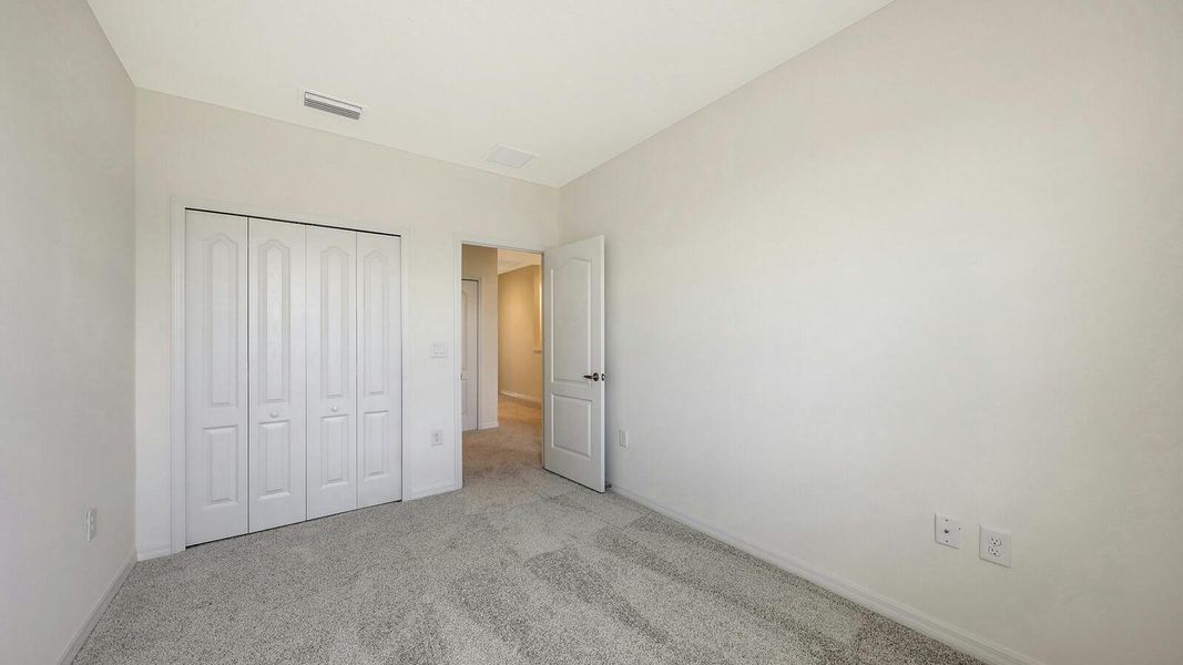 Spacious, unfurnished interior of a new home in Palm Grove Real Estate and Homes for Sale in Lakewood Ranch, FL - Neal Communities, Lakewood Ranch (Image 70).