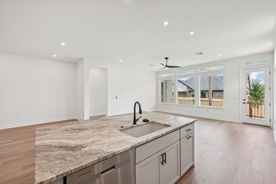 Furnished interior view inside a new home in Persimmon, Buda (Image 4).