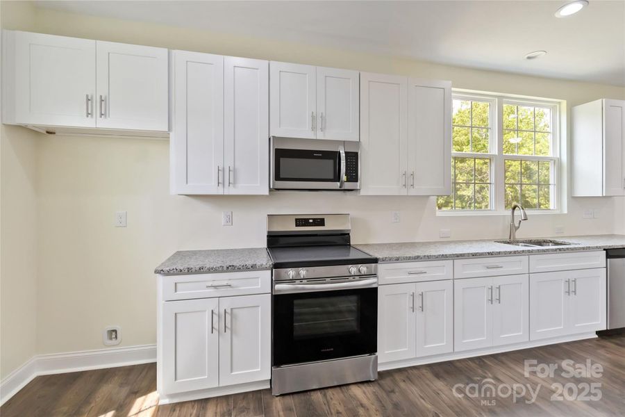 Furnished interior view inside a new home in , Monroe (Image 6).