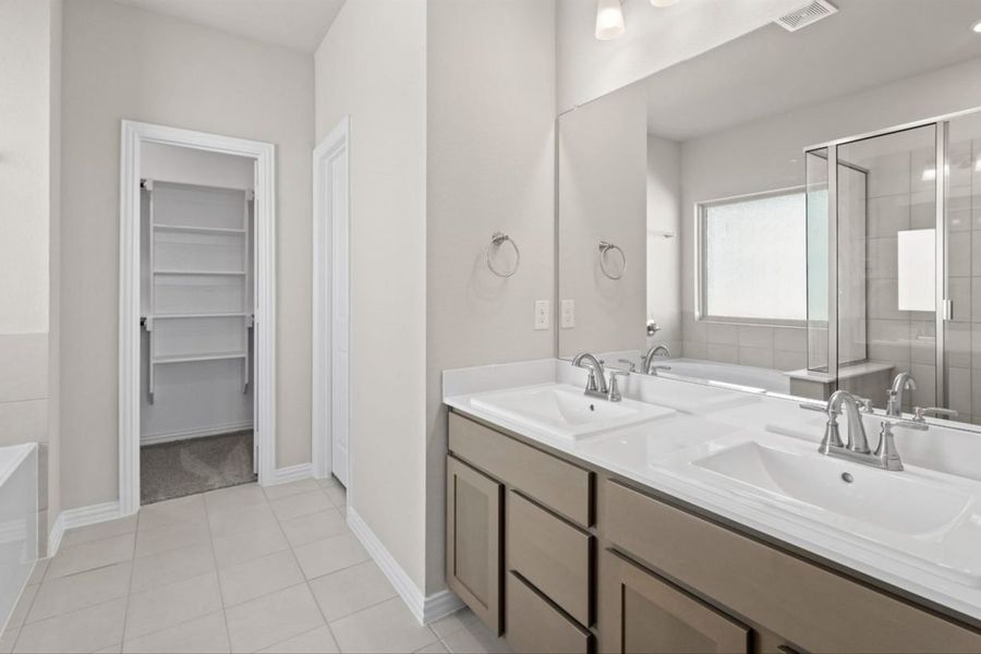 Representative furnished interior of a home built from the Rosewood Colony At Pinehurst Signature by Brohn Homes in Colony at Pinehurst, Pinehurst (Image 13).