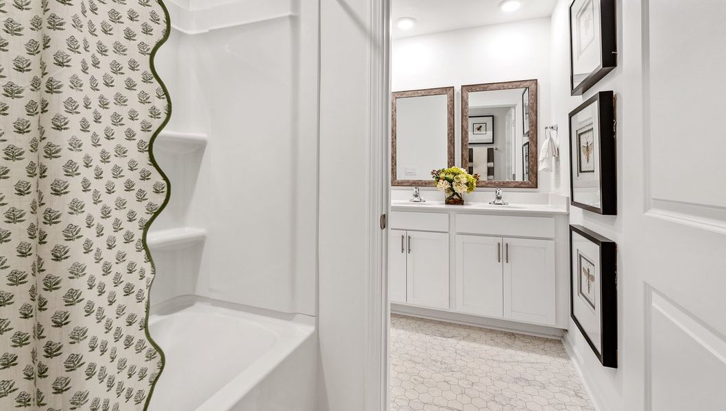 Representative furnished interior of a home built from the HAYDEN by D.R. Horton in Benjamin's Grove, Woodruff (Image 30).