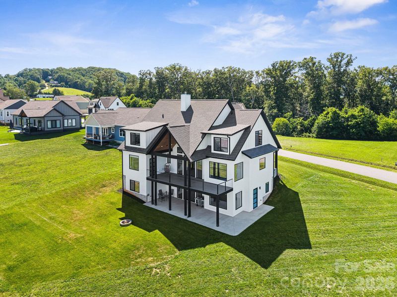 Front exterior of a new home in , Candler, NC, highlighting curb appeal (Image 31). Front exterior of a new home in , Candler, NC, highlighting curb appeal (Image 31).