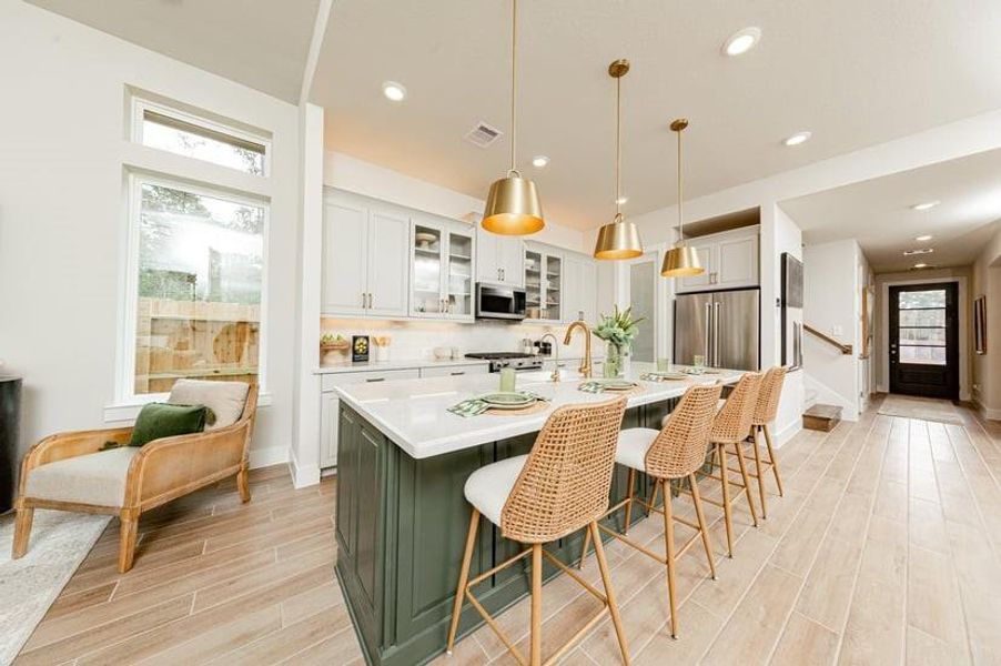Furnished interior view inside a new home in Bridgeland, Cypress (Image 12).