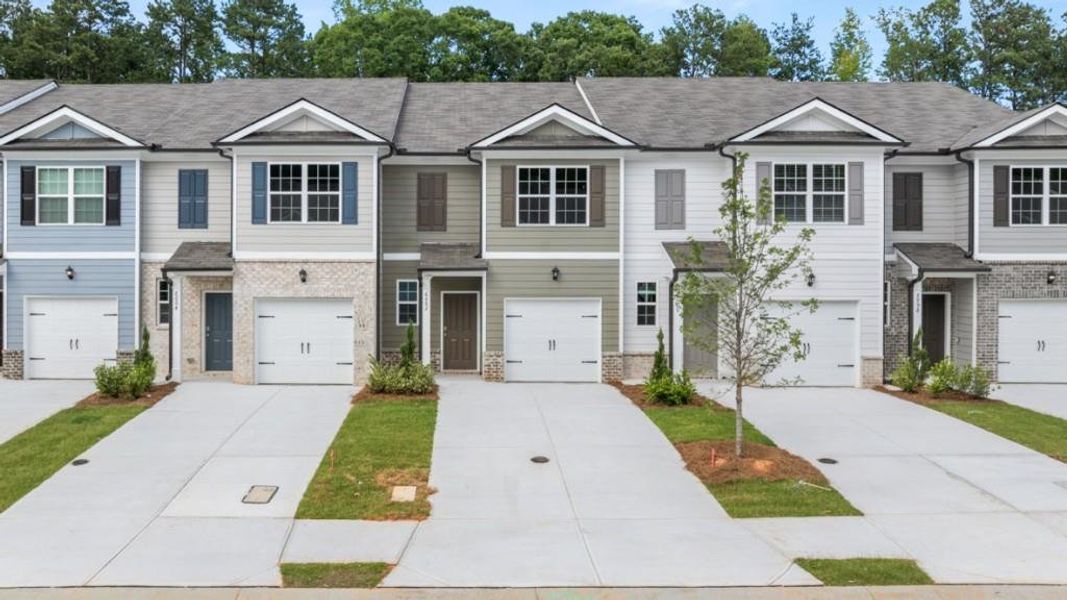 Front exterior of a new home in Woodbury Park, South Fulton, GA, highlighting curb appeal (Image 2).