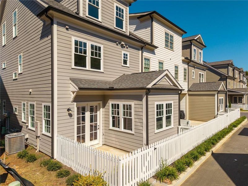 Exterior details and patio area of a home in , Ball Ground (Image 3).