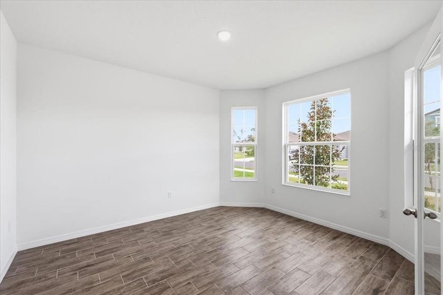 Spacious, unfurnished interior of a new home in Highfield at Twisted Oaks, Wildwood (Image 8).