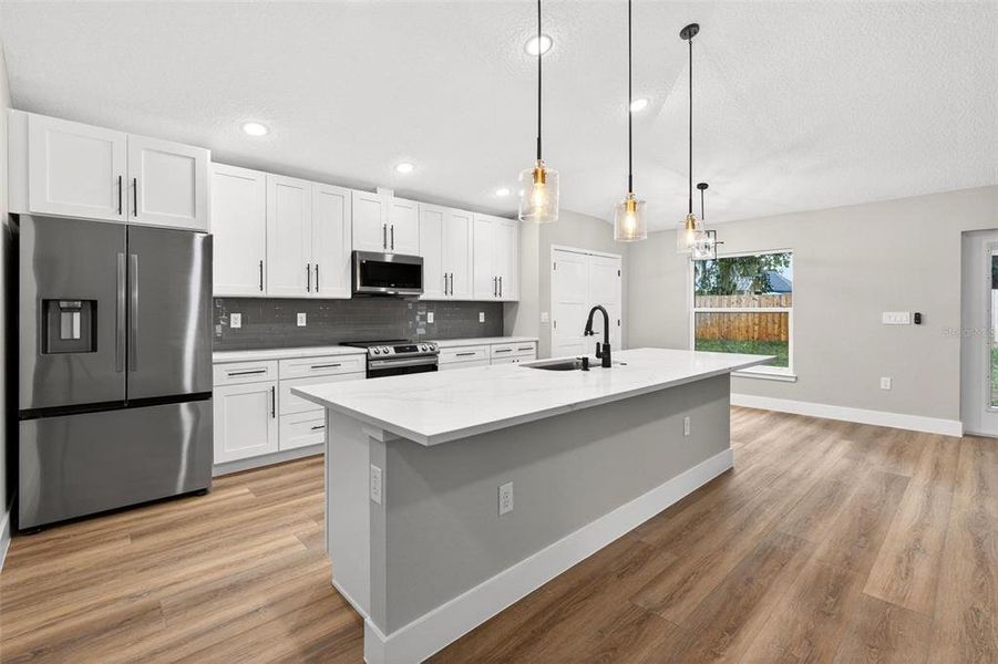 Furnished interior view inside a new home in , Umatilla (Image 7). Furnished interior view inside a new home in , Umatilla (Image 7).