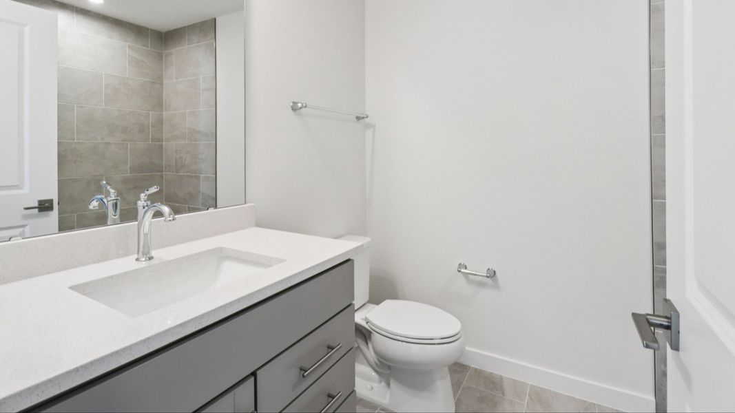 Guest Bath in the Monterey End Townhome by DRB Homes - Cyrene at Harmony in St Cloud FL