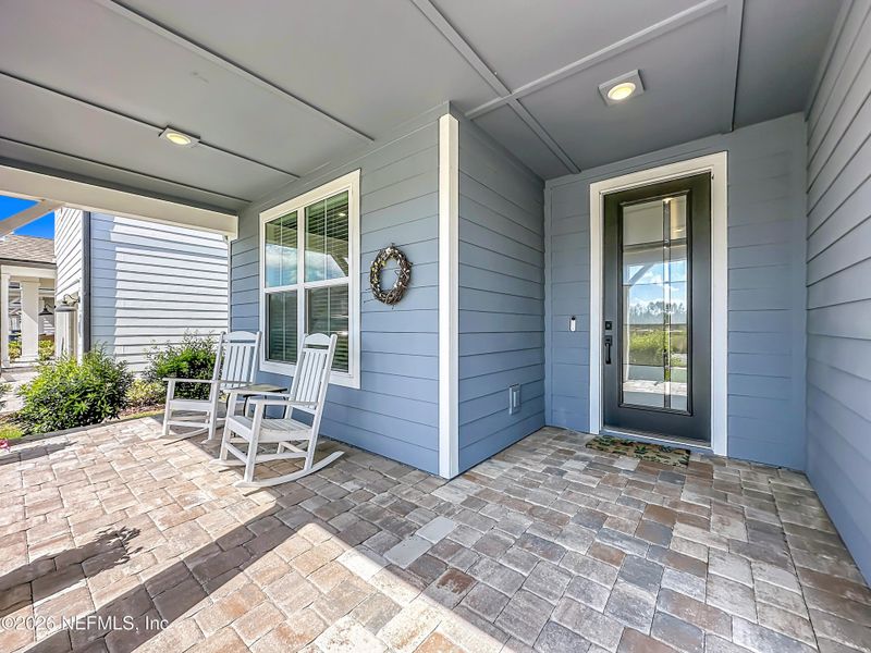 Exterior details and patio area of a home in Hawthorn Park at Wildlight, Yulee (Image 21).