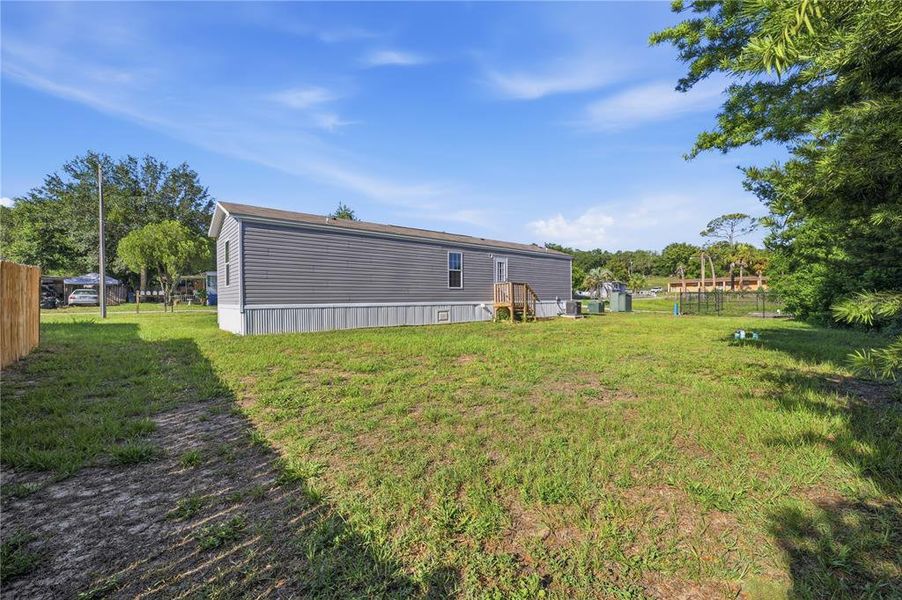 Exterior details and patio area of a home in , Brooksville (Image 27).
