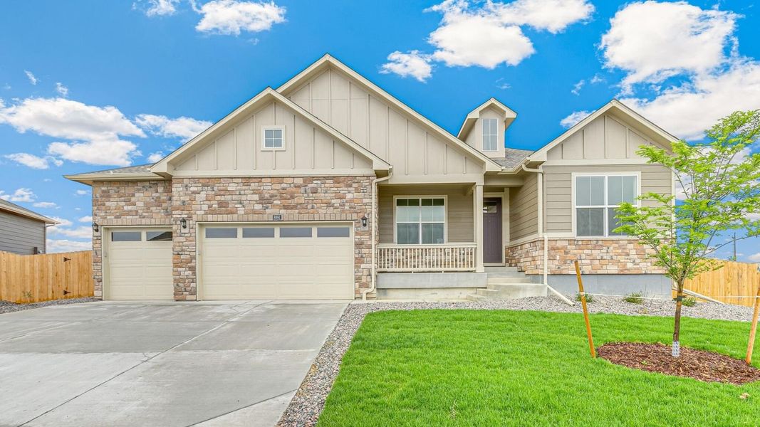 Front exterior of a new home in Vantage, Berthoud, CO, highlighting curb appeal (Image 1). Front exterior of a new home in Vantage, Berthoud, CO, highlighting curb appeal (Image 1).