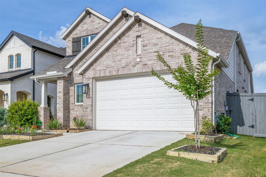 Front exterior of a new home in Jubilee, Hockley, TX, highlighting curb appeal (Image 2).